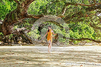 Beautiful young woman at Hahei Beach, New Zealand Stock Photo