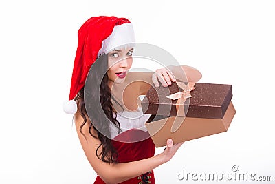 Beautiful young woman holding Christmas gift. Isolated on white Stock Photo