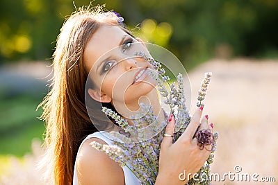 Beautiful young woman on lavander field - lavanda girl Stock Photo