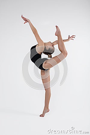Beautiful young woman limber exerciser in the studio Stock Photo