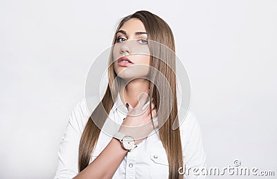 Beautiful young woman with wrist watch Stock Photo