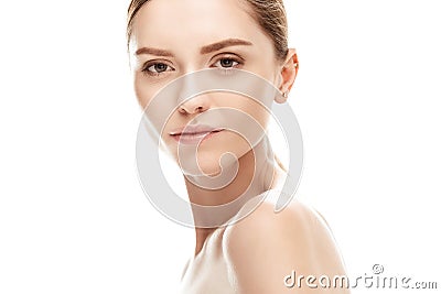 Beautiful young woman looking at camera isolated on white. Stock Photo