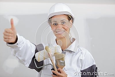 beautiful young woman painter with paint brush Stock Photo