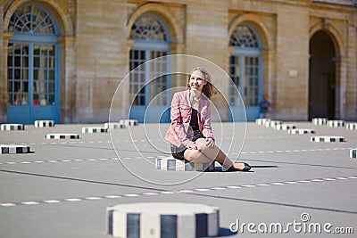 Beautiful young woman in Palais Royale in Paris Stock Photo