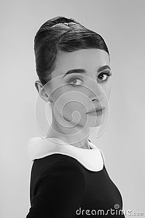 Beautiful young woman in retro style Stock Photo