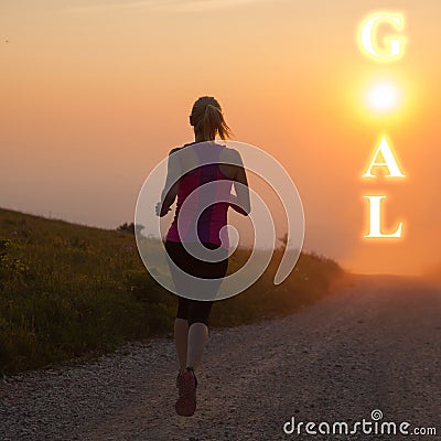 Beautiful young woman runns cross country on a mountian path at Stock Photo
