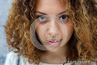 Beautiful young woman with serious expression Stock Photo