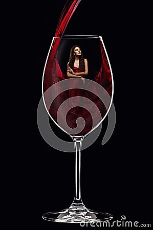 Girl in red dress inside wine glass Stock Photo