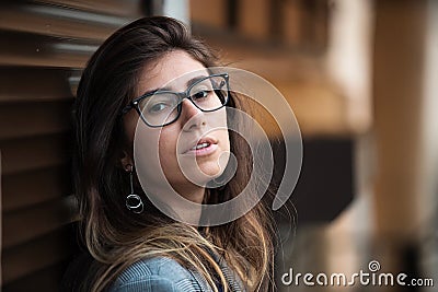 Beautiful young woman smiling cheerful walking on the street on a sunny day, casual pretty girl at the town Stock Photo