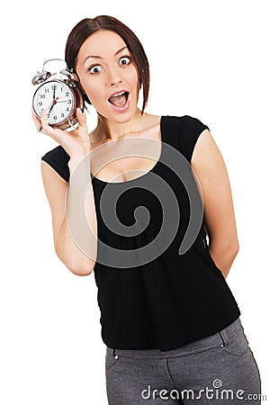 Beautiful young woman with vintage alarm clock Stock Photo