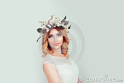 Beautiful young woman wearing floral headband Stock Photo