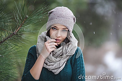 Beautiful young woman in wintertime outdoor Stock Photo