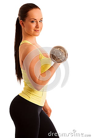 Beautiful young woman working out with dumbels in fitness gym Stock Photo