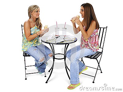 Beautiful Young Women Having Lunch Together Stock Photo