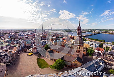 Beautifull aerial panoramic view from drone In sunny summer Day to histirical center Riga and quay of river Daugava Stock Photo