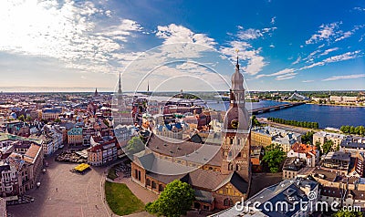 Beautifull aerial panoramic view from drone In sunny summer Day to histirical center Riga and quay of river Daugava. Famous Editorial Stock Photo