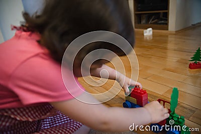 Beautifull child girl playing in house Stock Photo