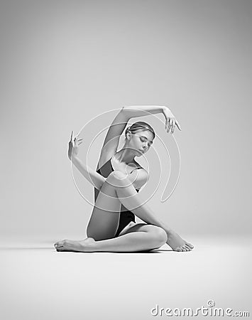 Beautifull flexible blonde girl posing. Gymnastics. Stock Photo