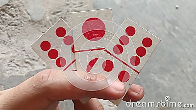 Beautifull full domino cards at hand Stock Photo