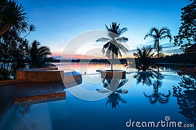 Beautifull luxury swimming pool near beach front, looking sea view Stock Photo