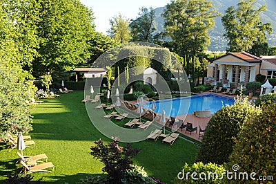 The beautifull mediteranian garden at the luxury Hotel Giardino in Ascona Stock Photo