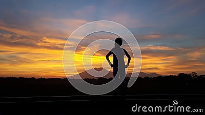 Beautifull sunrise view of girl silluete Stock Photo