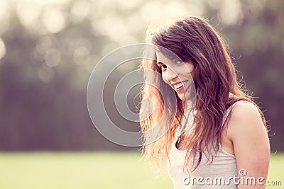 Beautifull young smiling woman with long dark hair. Stock Photo