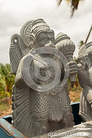 Beautifully carved statue of Hindu god Hanuman or Maruti rock sculpture at hampi for selling Stock Photo