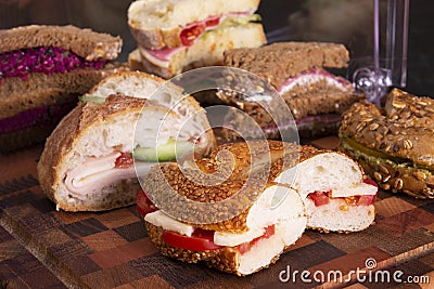 Beautifully decorated catering banquet table with different food snacks and appetizers with sandwich. Stock Photo