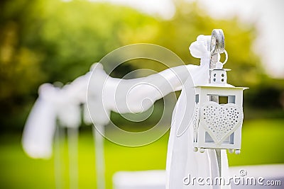 Beautifully decorated outdoor hanging wedding lantern. Wedding decor. Stock Photo