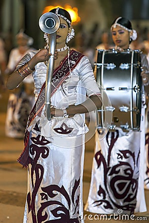 Beautifully dressed female musicians perform at the Kataragama Festival in Sri Lanka. Editorial Stock Photo