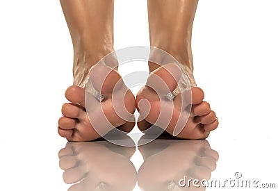 Beautifully groomed female foot with raised toes Stock Photo