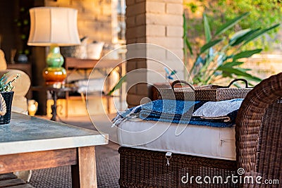 Beautifully landscaped desert patio in Arizona at sunset. Outdoor furniture with southwest style decor. Stock Photo