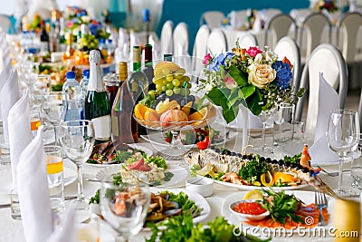 Beautifully served festive table in the great hall Stock Photo