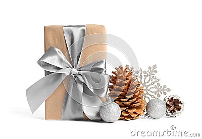 Beautifully wrapped gift box, pine cones and decorations Stock Photo