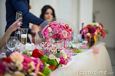 Beautifuly decorated wedding reception table covered with fresh Stock Photo