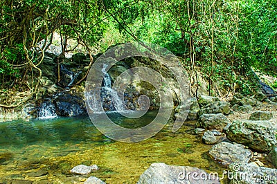 Beautify of medium waterfall around stones and forest at Khao Yai National Park Stock Photo