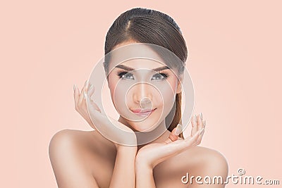 Beauty Asian Portrait, Beautiful Spa Woman Touching her Face. Perfect Fresh Skin Stock Photo