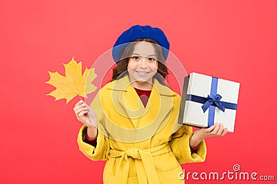 Beauty in autumn style. autumn kid fashion. fall season. school shopping sale. girl child in french beret hold gift Stock Photo