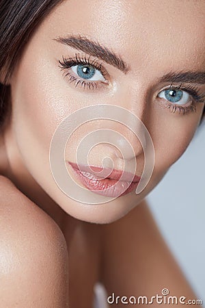 Beauty. Beautiful Woman Close Up Portrait. Young Blue-Eyed Model With Perfect Skin And Natural Daily Makeup. Stock Photo