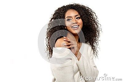 Beauty black skin woman African Ethnic female face. Young african american model with long afro hair.Smiling model isolated on Stock Photo