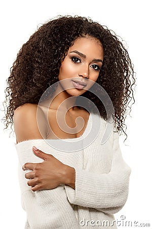 Beauty black skin woman African Ethnic female face. Young african american model with long afro hair.Smiling model isolated on Stock Photo