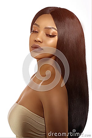 Beauty black skin woman African Ethnic female face. Young african american model with long hair Stock Photo