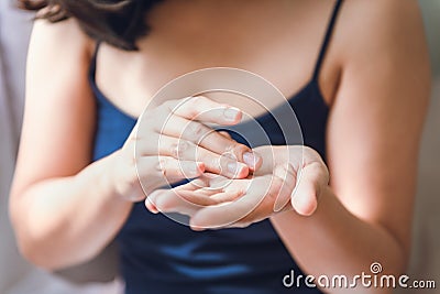Beauty Body Skin Care and Cosmetic Apply Concept, Close-Up of Woman Hands is Applying Moisturizing Serum for Healthy Skin. Stock Photo