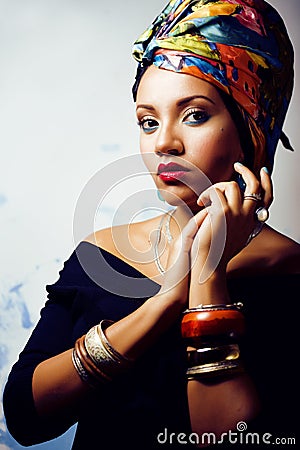 Beauty bright african woman with creative make up, shawl on head Stock Photo