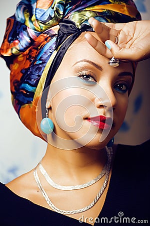 Beauty bright african woman with creative make up, shawl on head Stock Photo