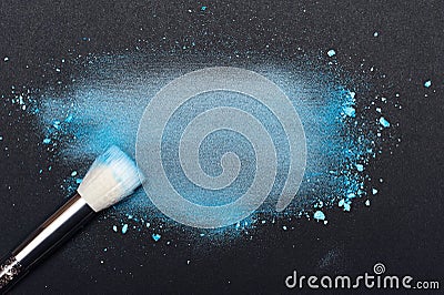 Beauty Brush and meared blue Make-up Powder Stock Photo