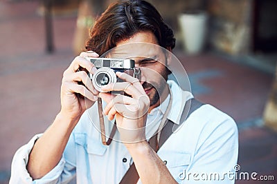 Beauty can be seen in all things. a handsome young tourist checking out the sights. Stock Photo