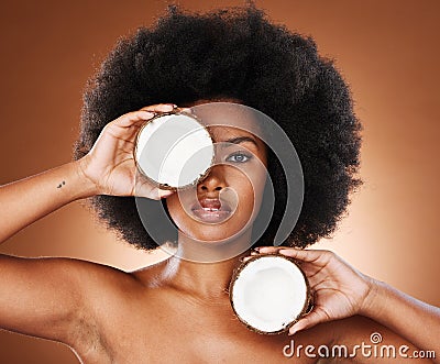 Beauty, coconut and skincare, black woman with natural product for diy facial treatment, organic and fresh portrait Stock Photo