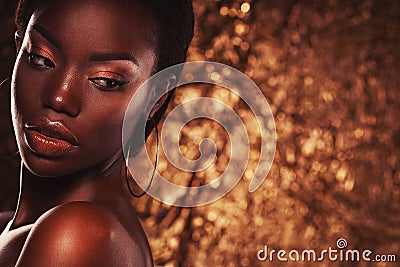 Beauty concept: Portrait of a sensual young African woman with colored make up Stock Photo